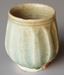 Sisatchanalai celadon cup from the 'Longquan' wreck; height 8cm