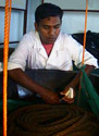 Conservation: Kamal cleaning rope coil, Dec 01.