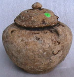 Sealed jar with four ringhandles, height 14cm